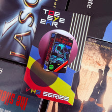 Load image into Gallery viewer, The People Under The Stairs VHS Enamle Pin
